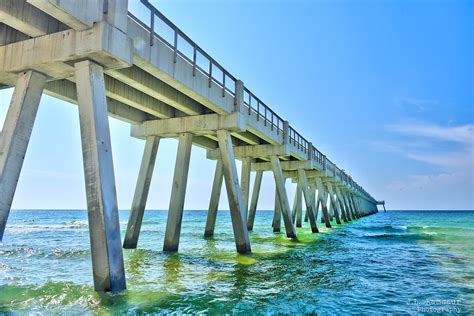 Navarre pier - The Navarre Pier, located at 8579 Gulf Blvd. Open at 5 AM and close at 11 PM. Call 850-710-3239 for more information. At 1,545 feet long and 30 feet above the water, the Navarre pier offers fun for the whole family. Visitors can rent a fishing pole at the privately operated bait & tackle shop or enjoy the breeze at the outdoor restaurant.